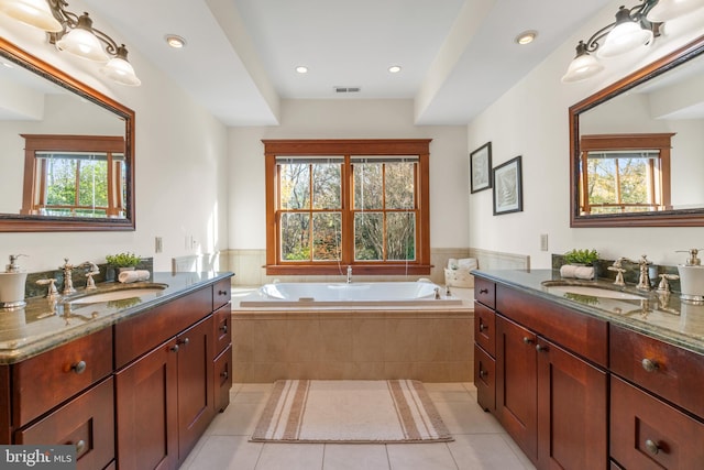 bathroom featuring tile patterned flooring and a wealth of natural light