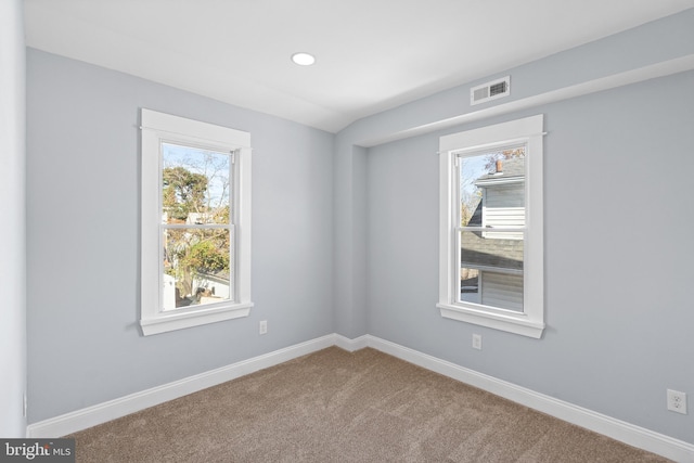 view of carpeted spare room