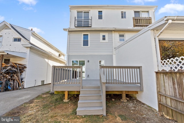 rear view of house with a deck