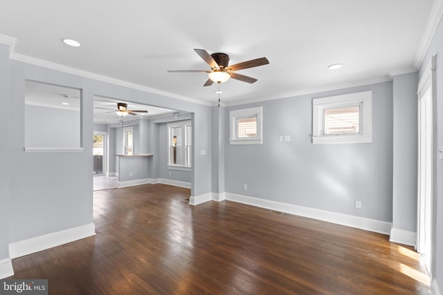 unfurnished room with dark hardwood / wood-style floors, ceiling fan, and ornamental molding