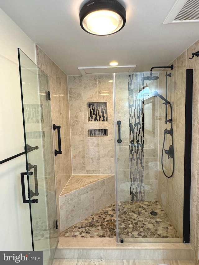 bathroom featuring walk in shower