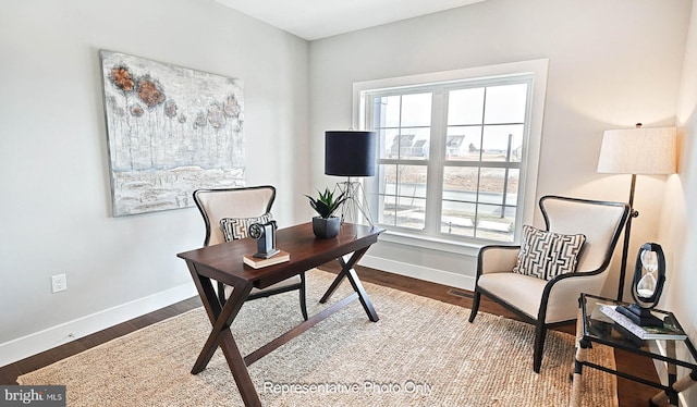 office space with hardwood / wood-style floors