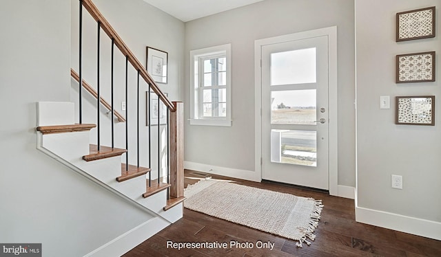 foyer featuring dark wood-type flooring