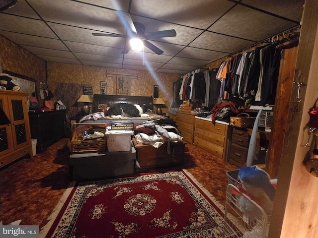 bedroom featuring a paneled ceiling and ceiling fan