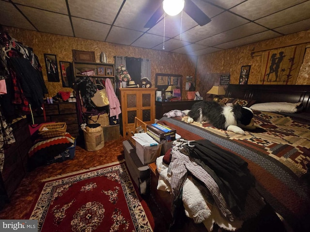 bedroom featuring a paneled ceiling and ceiling fan