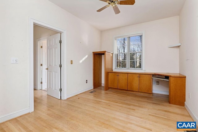 interior space featuring ceiling fan and light wood-type flooring