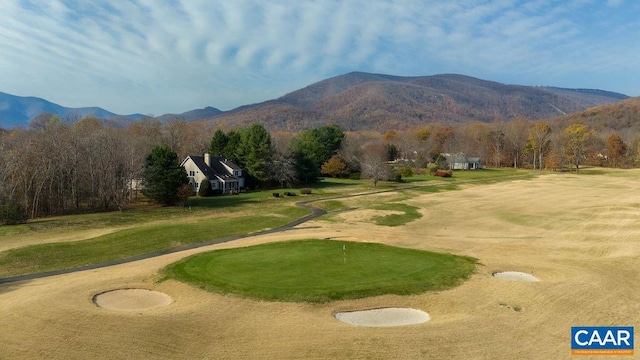 surrounding community with a mountain view