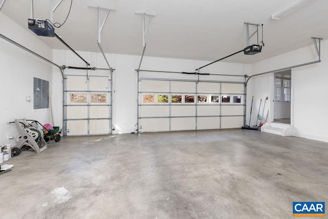 garage featuring electric panel and a garage door opener