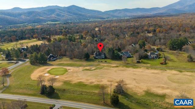 drone / aerial view featuring a mountain view