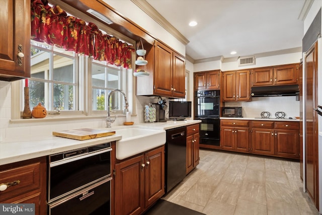 kitchen featuring black appliances, sink, ornamental molding, and backsplash