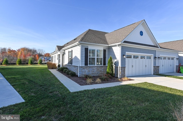 exterior space with a front yard and a garage