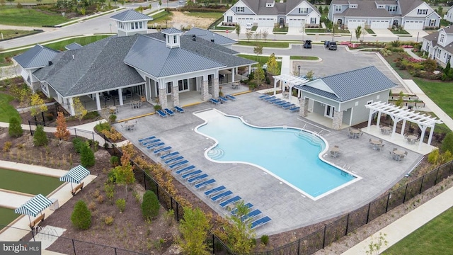 view of swimming pool with a pergola