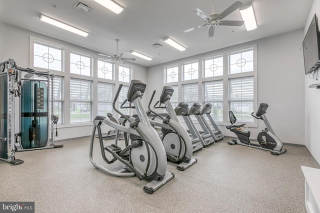 workout area featuring ceiling fan