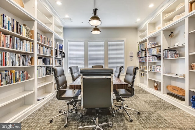 carpeted office featuring built in features