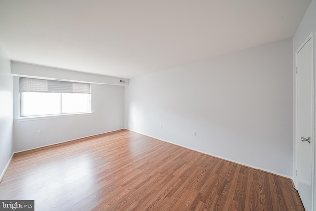 empty room featuring light wood-type flooring