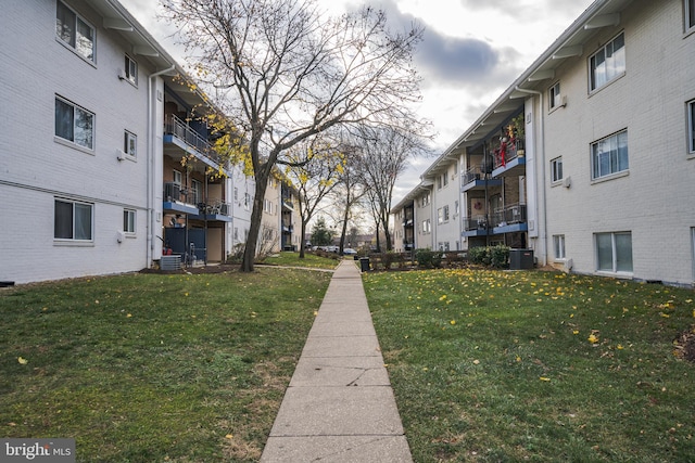 view of home's community featuring a yard