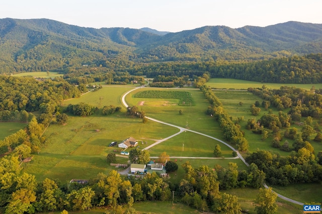 aerial view with a mountain view and a rural view