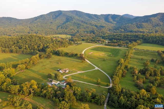 birds eye view of property featuring a mountain view and a rural view