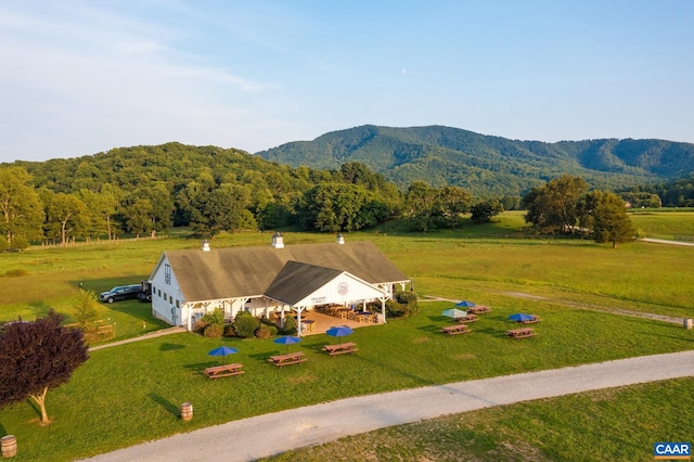 drone / aerial view featuring a mountain view