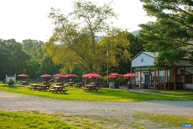 view of home's community featuring a yard