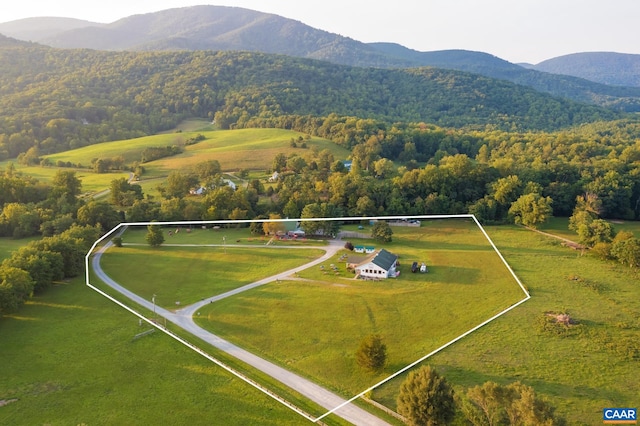 bird's eye view featuring a mountain view and a rural view