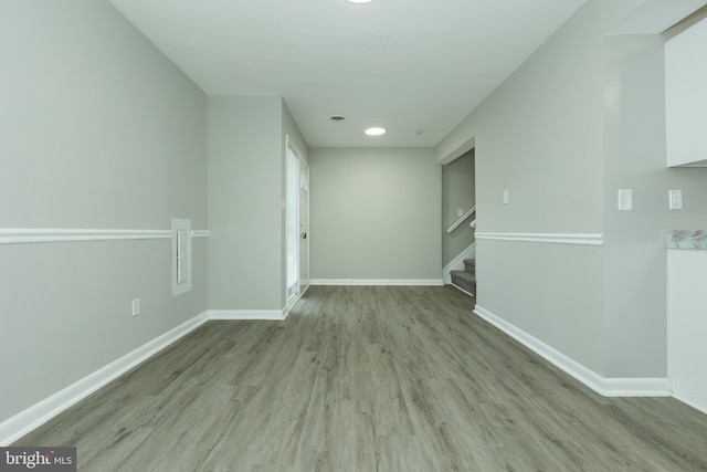 unfurnished room featuring light wood-type flooring