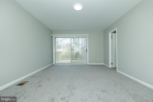 empty room featuring carpet flooring