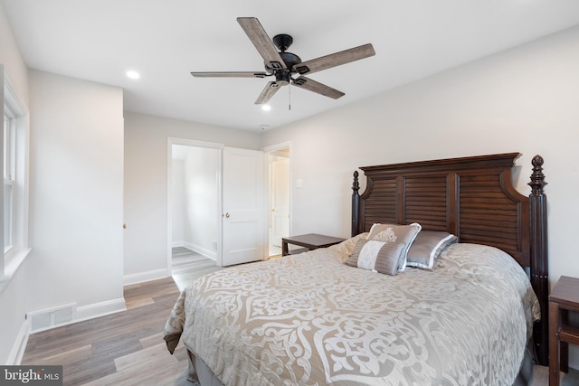 bedroom featuring ceiling fan and wood-type flooring