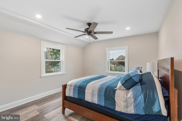 bedroom featuring ceiling fan and hardwood / wood-style flooring