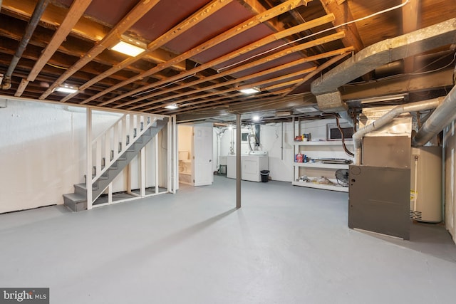 basement featuring washer and clothes dryer