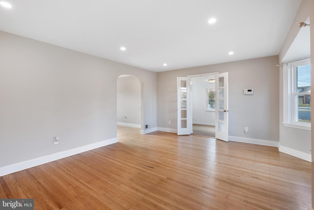 unfurnished living room featuring light hardwood / wood-style floors