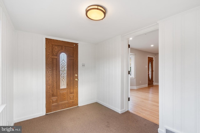 entrance foyer featuring hardwood / wood-style floors