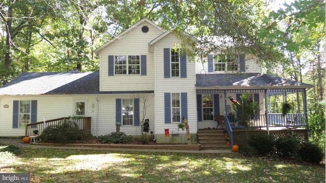 view of front of home with a front yard