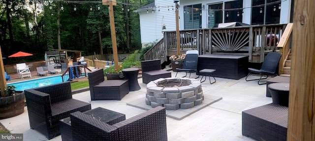 view of patio featuring an outdoor fire pit