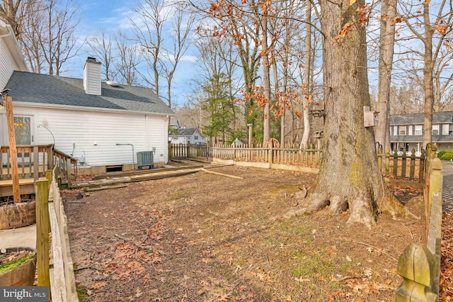 view of yard with central AC unit