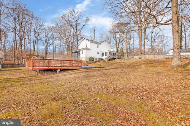 view of yard featuring a wooden deck