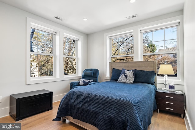 bedroom featuring light wood-type flooring