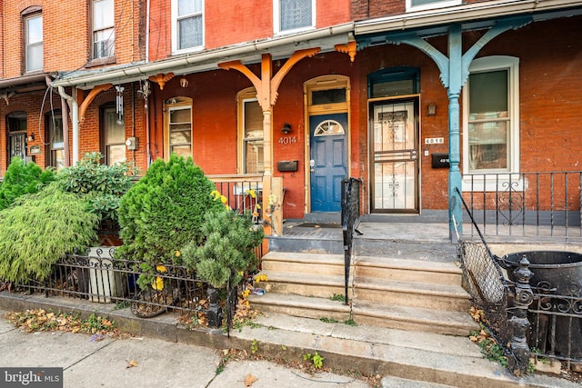 doorway to property featuring a porch