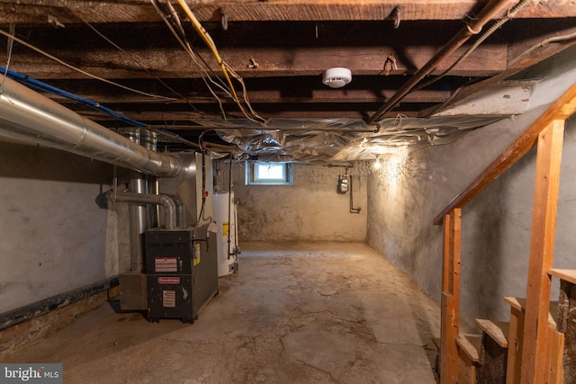 basement featuring gas water heater and heating unit