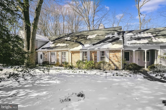 view of snow covered property