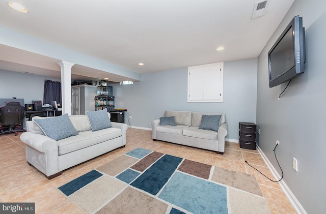 living room with light tile patterned floors