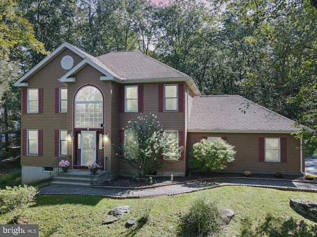 view of front property with a front yard