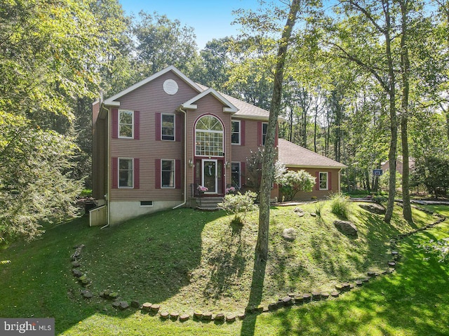 view of front facade featuring a front yard