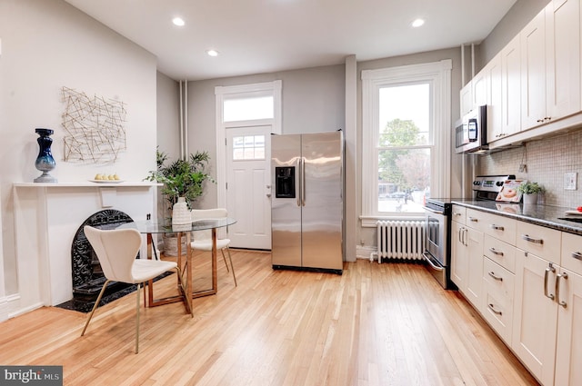 kitchen with white cabinetry, plenty of natural light, and appliances with stainless steel finishes