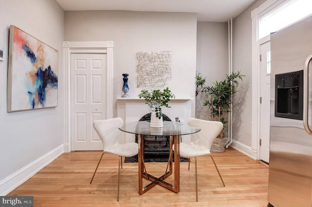 dining room with light hardwood / wood-style floors