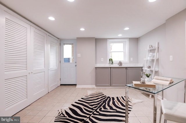 interior space with light tile patterned floors