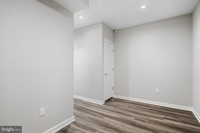 unfurnished room featuring hardwood / wood-style floors