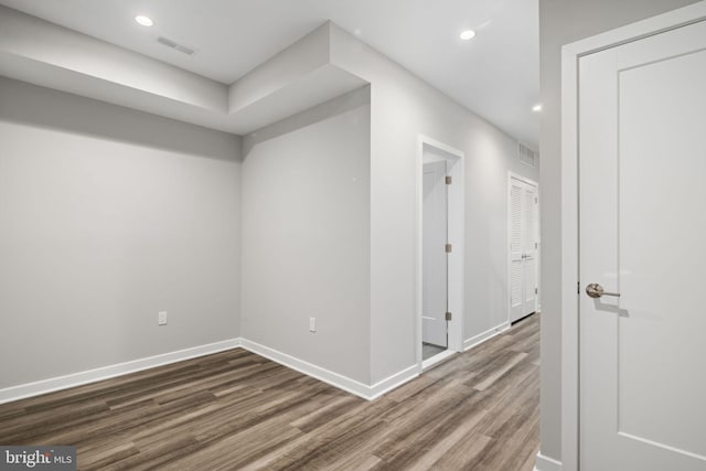 interior space with dark hardwood / wood-style flooring