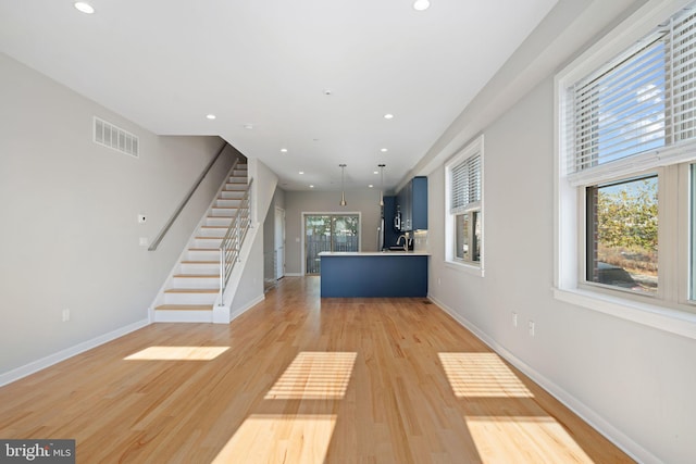 interior space with light hardwood / wood-style flooring