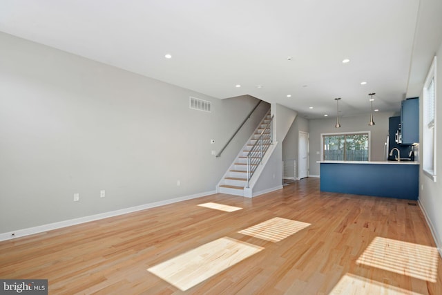 interior space with light hardwood / wood-style flooring